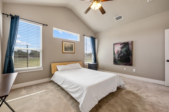 carpeted bedroom with lofted ceiling and ceiling fan