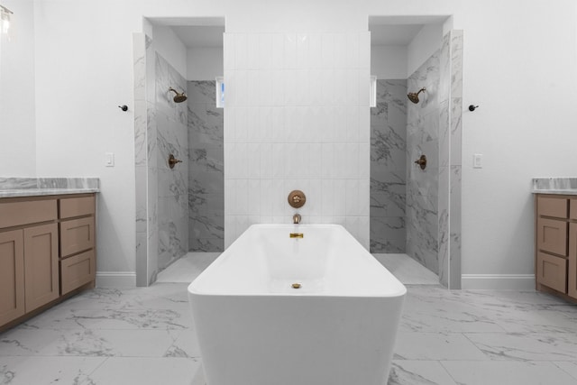 bathroom with tile patterned flooring and vanity