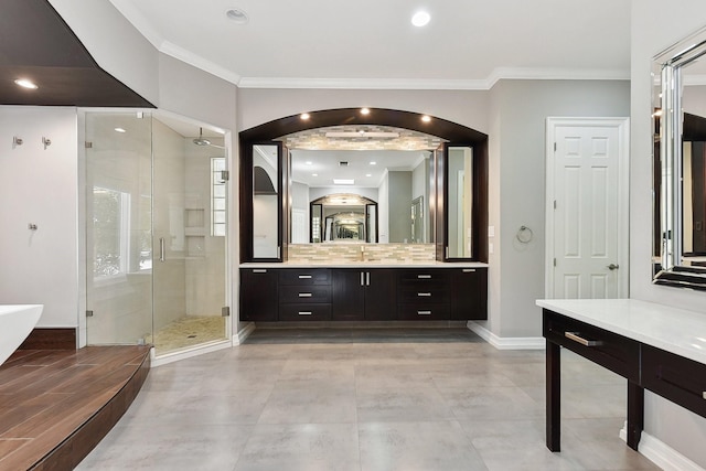 bathroom with crown molding, ceiling fan, separate shower and tub, and vanity