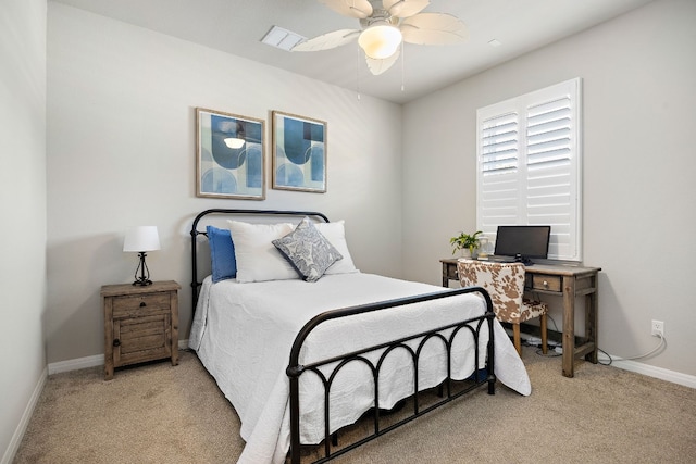 bedroom featuring ceiling fan and light carpet