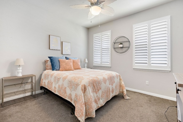 bedroom with carpet flooring, multiple windows, and ceiling fan