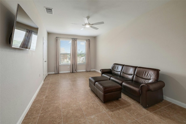 living room with ceiling fan