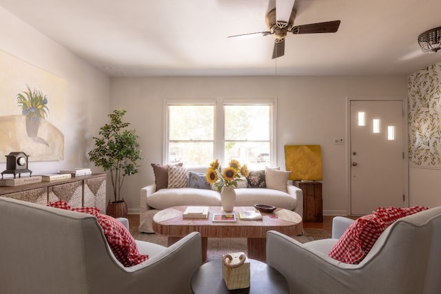 living room featuring hardwood / wood-style flooring and ceiling fan