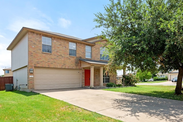 2700 Breezy Point Cv, Round Rock, TX 78665 - view of front facade featuring brick siding, a garage, and concrete driveway