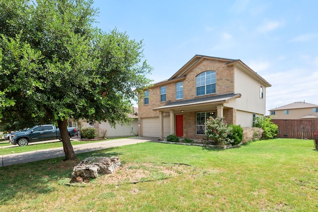 view of front of house featuring a garage, a porch, and a front yard