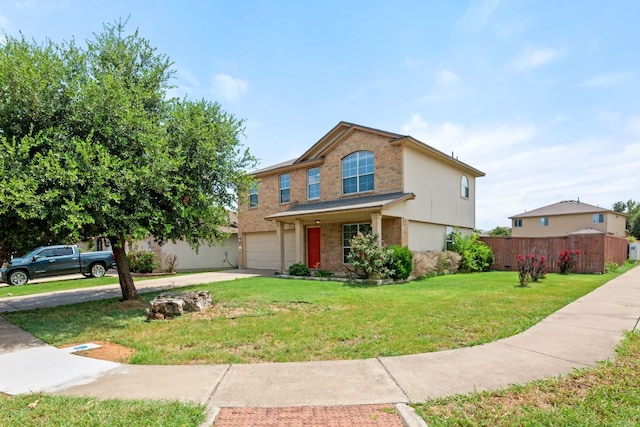 2700 Breezy Point Cv, Round Rock, TX 78665 - traditional-style home with a garage, driveway, and brick siding