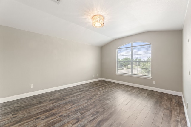 2700 Breezy Point Cv, Round Rock, TX 78665 - spare room with dark wood finished floors and vaulted ceiling