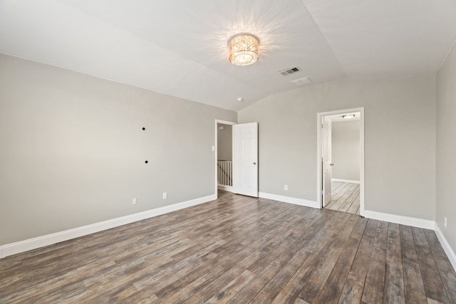 2700 Breezy Point Cv, Round Rock, TX 78665 - unfurnished bedroom featuring wood finished floors and vaulted ceiling