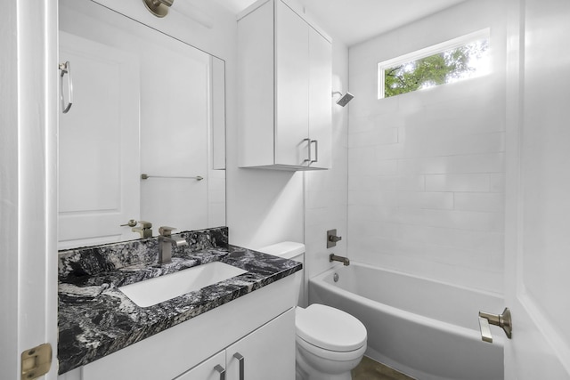 full bathroom featuring shower / bath combination, toilet, and vanity