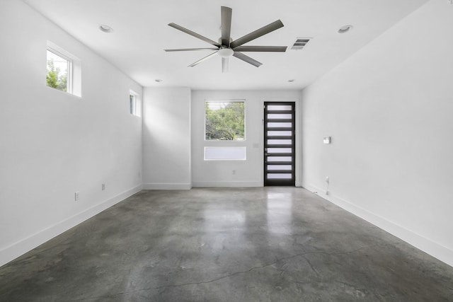 unfurnished room with ceiling fan