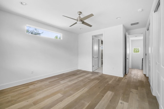 unfurnished bedroom featuring light wood-type flooring and ceiling fan