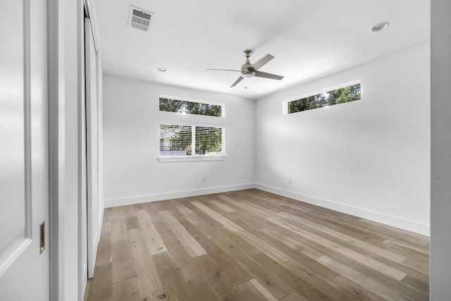 unfurnished room featuring ceiling fan and light hardwood / wood-style floors