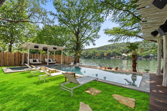 view of pool featuring a water view, a lawn, and a pergola