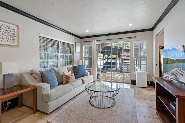 living room featuring light tile patterned flooring and ornamental molding