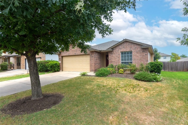 view of front facade featuring a garage and a front yard