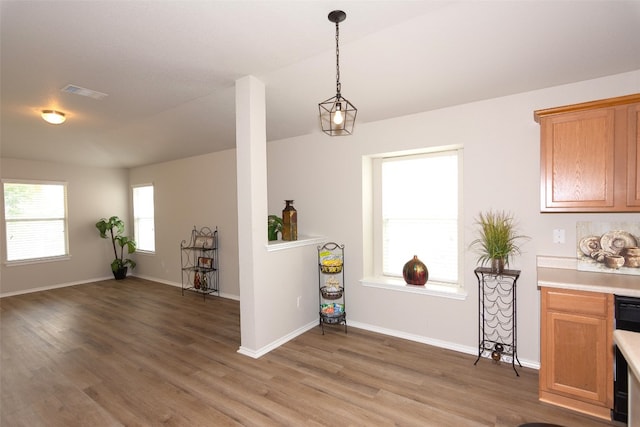 dining room with hardwood / wood-style flooring