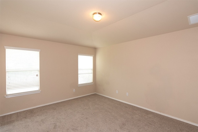 unfurnished room featuring carpet floors