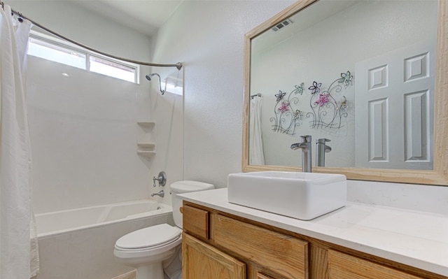 full bathroom featuring vanity, toilet, and shower / bath combo