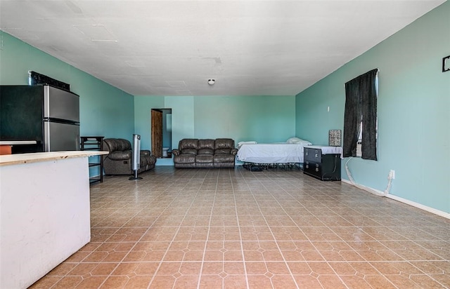 living room with light tile patterned floors