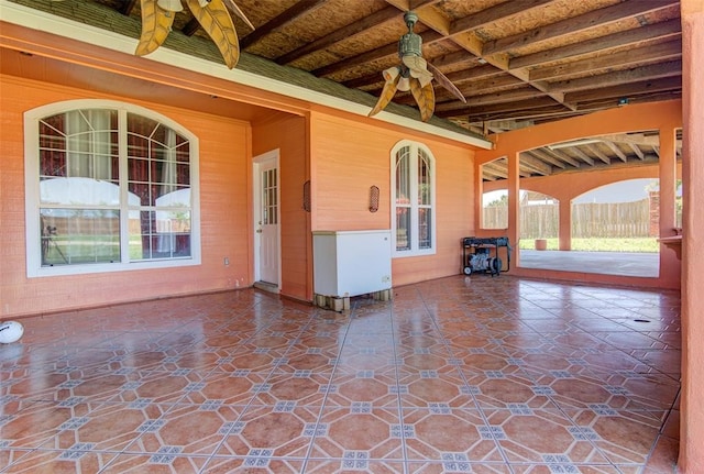 view of patio featuring ceiling fan