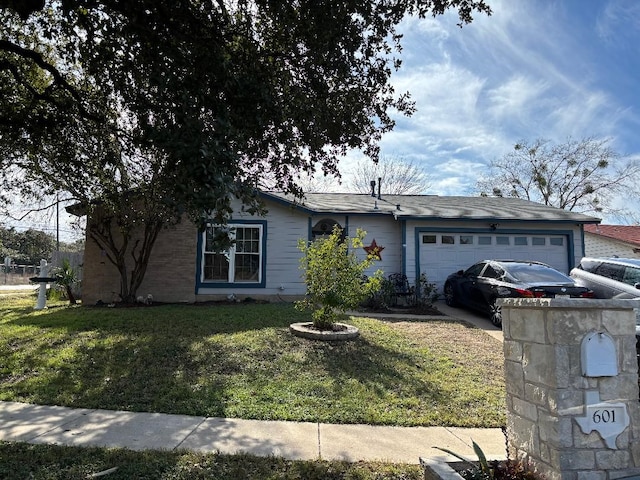 ranch-style home with a garage and a front yard