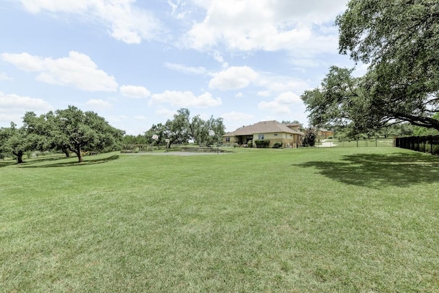 view of yard with fence