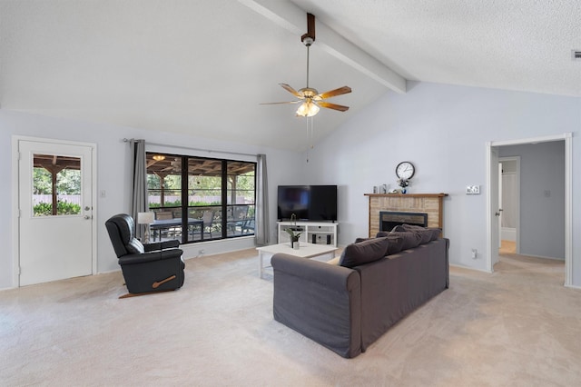 living room featuring a brick fireplace, light colored carpet, a textured ceiling, and lofted ceiling with beams