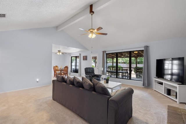 carpeted living room featuring ceiling fan, beamed ceiling, a textured ceiling, and high vaulted ceiling