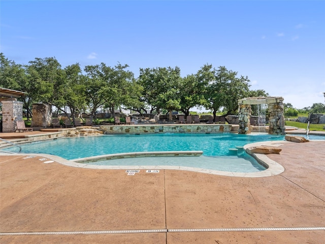 3417 Flat Iron Ct, Leander, TX 78641 - community pool with a patio area