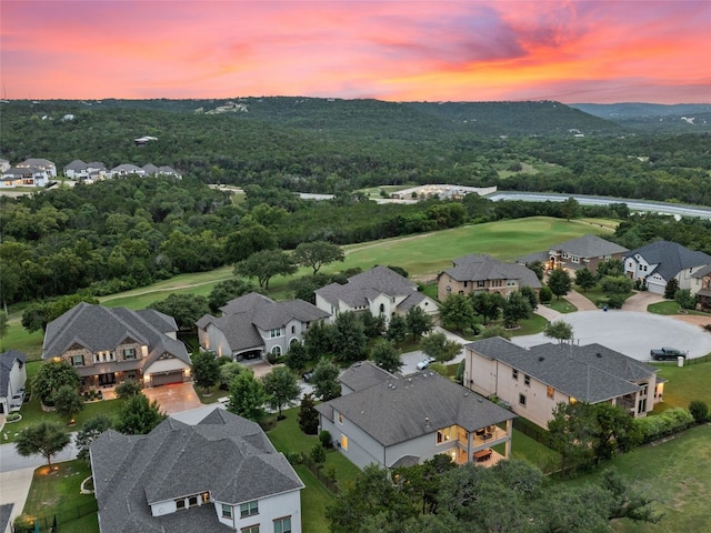 3417 Flat Iron Ct, Leander, TX 78641 - aerial perspective of suburban area featuring a local golf course and a forest