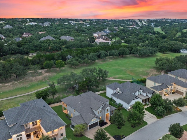 aerial view at dusk with a residential view