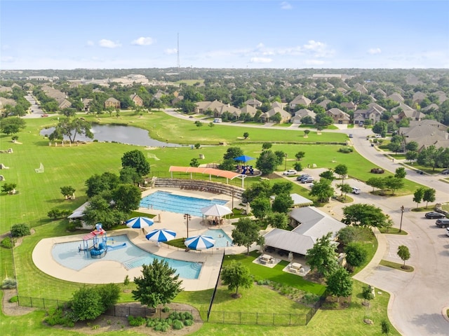 aerial view featuring a water view and a residential view