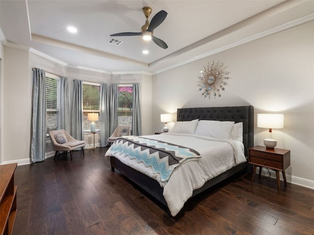 3417 Flat Iron Ct, Leander, TX 78641 - bedroom featuring a tray ceiling, wood-type flooring, recessed lighting, ornamental molding, and ceiling fan
