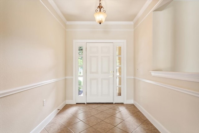 foyer featuring light tile patterned floors and crown molding