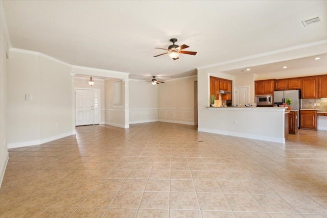 unfurnished living room with crown molding, ceiling fan, and light tile patterned floors