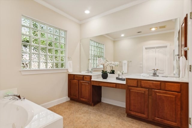 bathroom with tile patterned floors, a tub to relax in, and a wealth of natural light