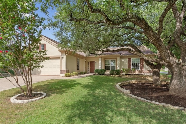 ranch-style house featuring a garage and a front lawn