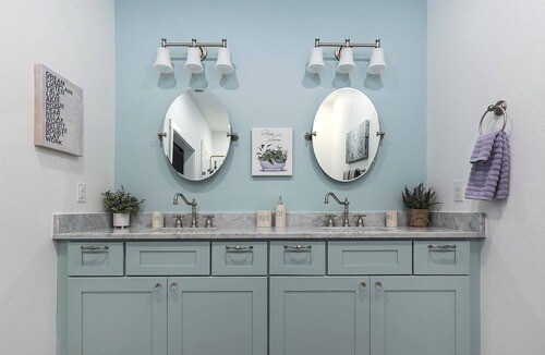 bathroom with double vanity