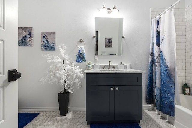 bathroom with shower / tub combo with curtain and vanity