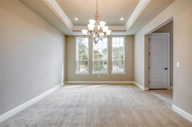 unfurnished room featuring light carpet, a raised ceiling, crown molding, and a notable chandelier