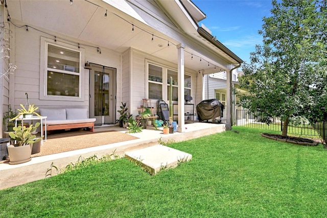 exterior space with a lawn and a patio area