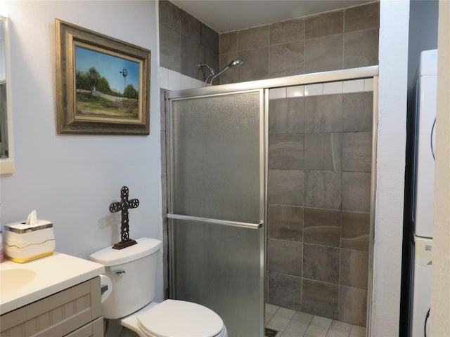 bathroom with vanity, toilet, and walk in shower