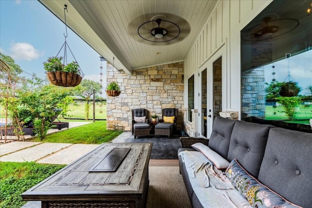 view of patio featuring ceiling fan, french doors, and an outdoor hangout area