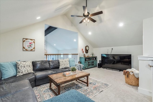 living room featuring carpet, ceiling fan, and lofted ceiling