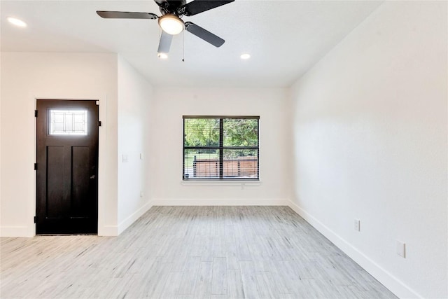 314 Saxon Ln, Austin, TX 78741 - entrance foyer featuring light wood-style flooring, a ceiling fan, and recessed lighting