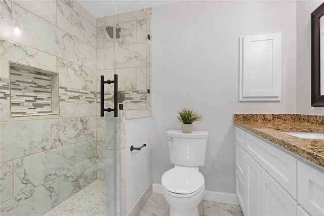 1505 Old Marion Rd, New Braunfels, TX 78130 - bathroom with toilet, tiled shower, vanity, marble finish floor, and baseboards