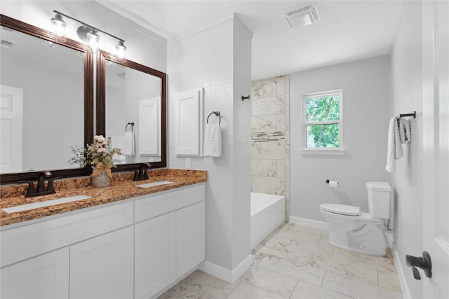 full bathroom featuring double vanity, tile patterned flooring, tiled shower / bath combo, and toilet