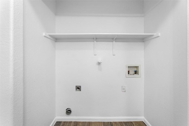 4515 Blue Meadow Dr, Austin, TX 78744 - laundry area featuring dark wood-style floors, hookup for a washing machine, and hookup for an electric dryer