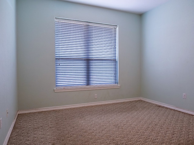 empty room with carpet floors