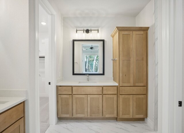 151 William Hersee Dr, Bastrop, TX 78602 - full bath with vanity, marble look tiles, and ceiling fan